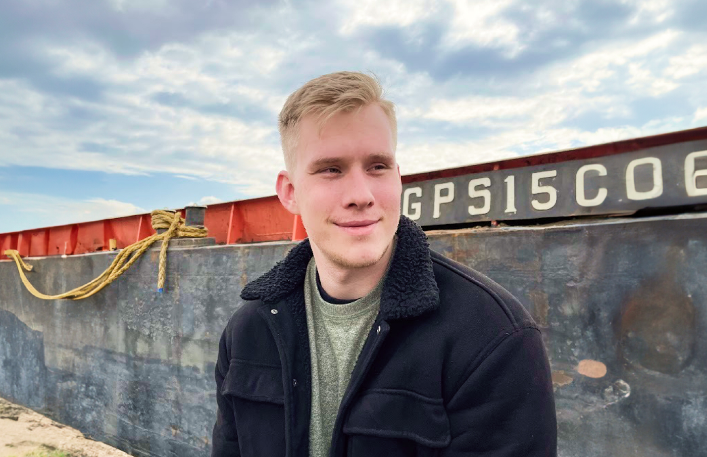 A picture of Adam looking away from the camera.